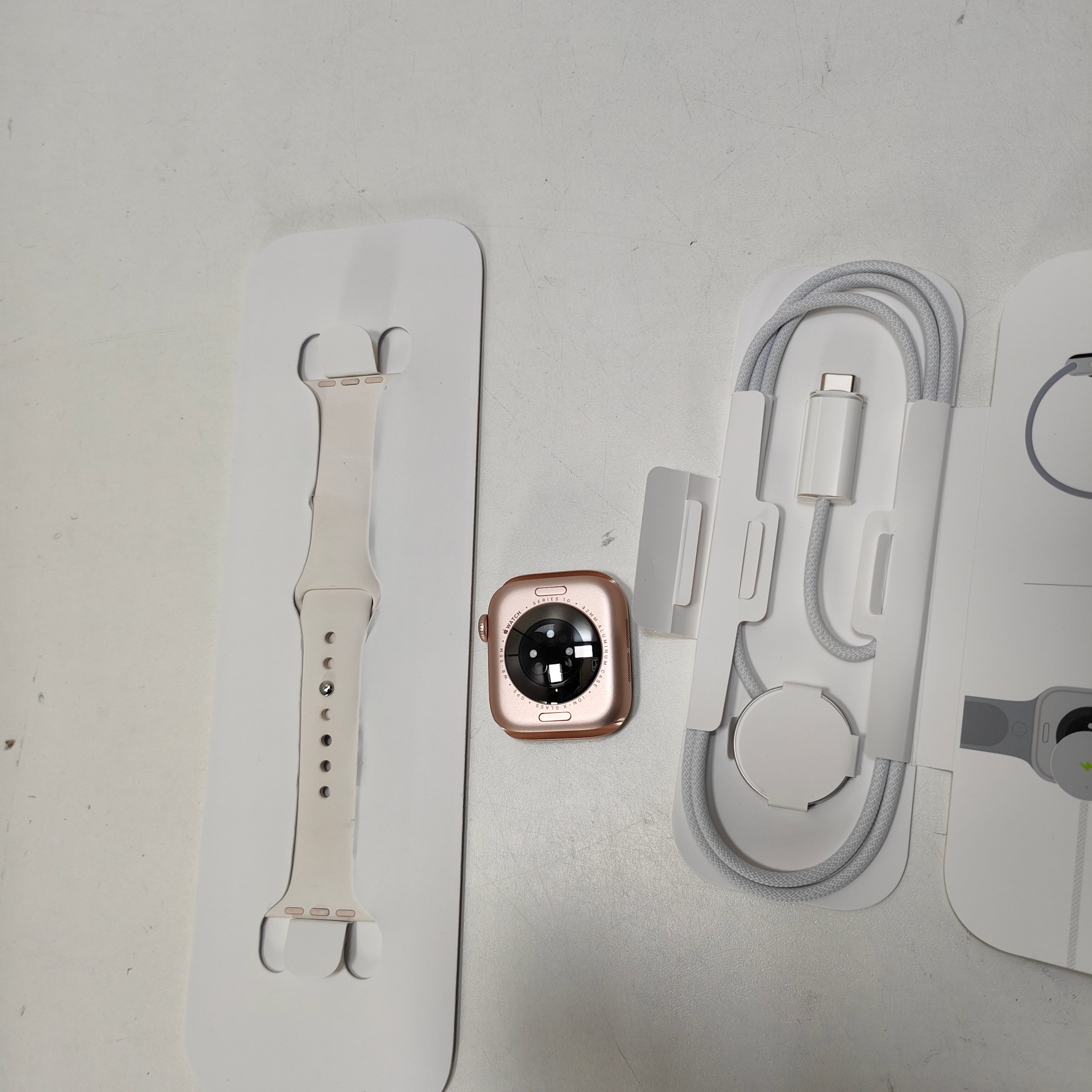 Apple Watch Series 10 42mm Roségoud Sportband S/M