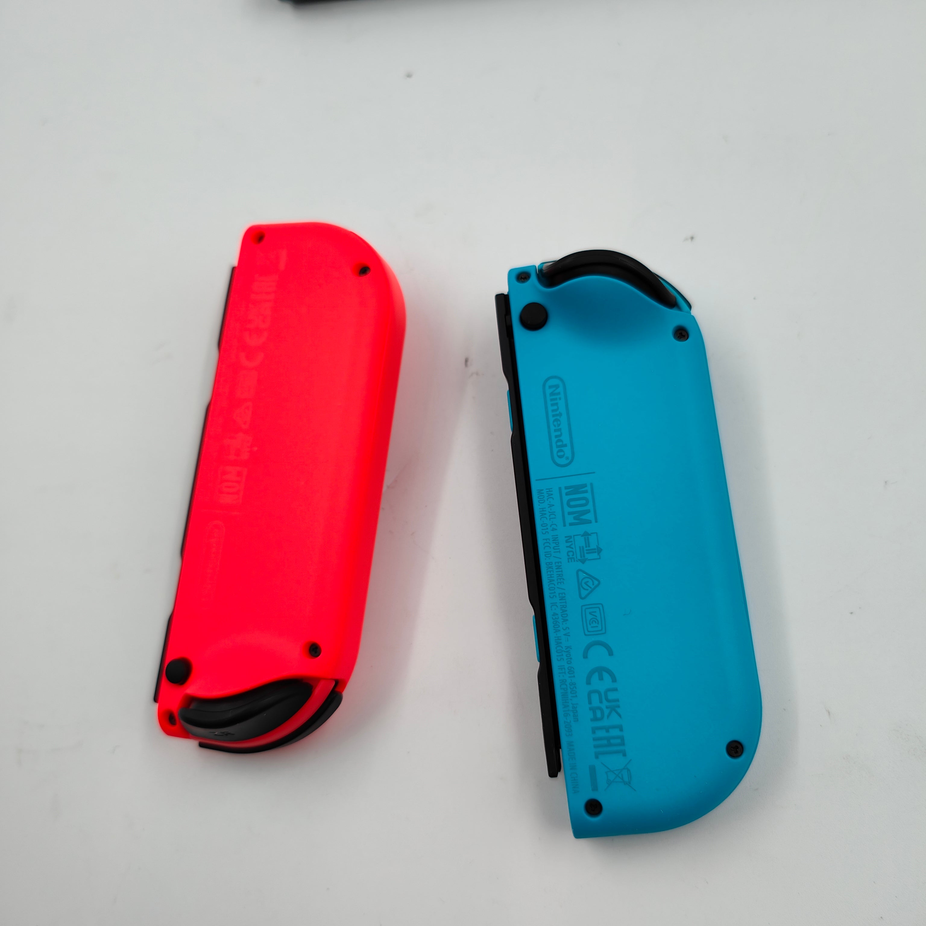 Nintendo Switch OLED Blauw Rood