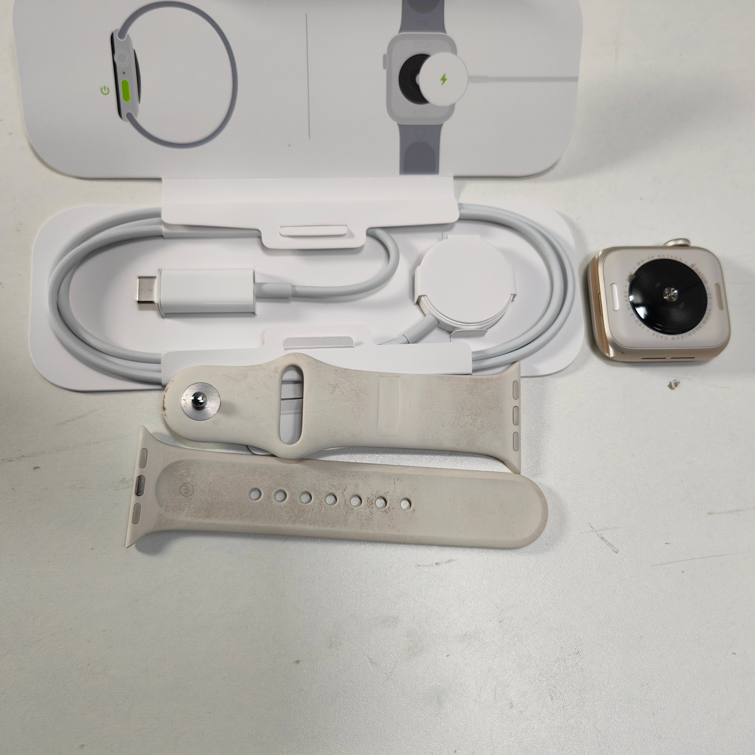 Apple Watch SE (2024) 40mm Starlight Sportband S/M