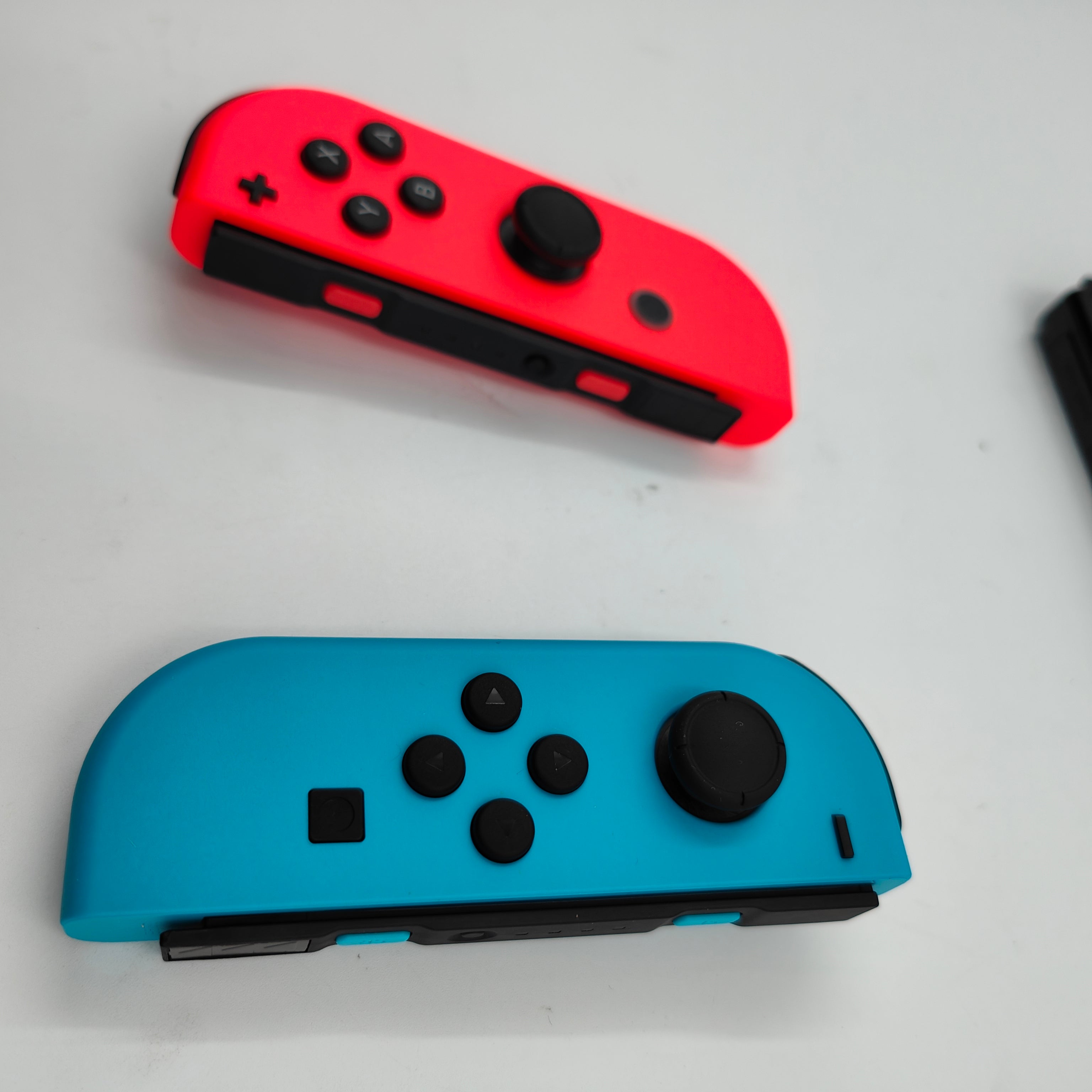Nintendo Switch OLED Blauw Rood