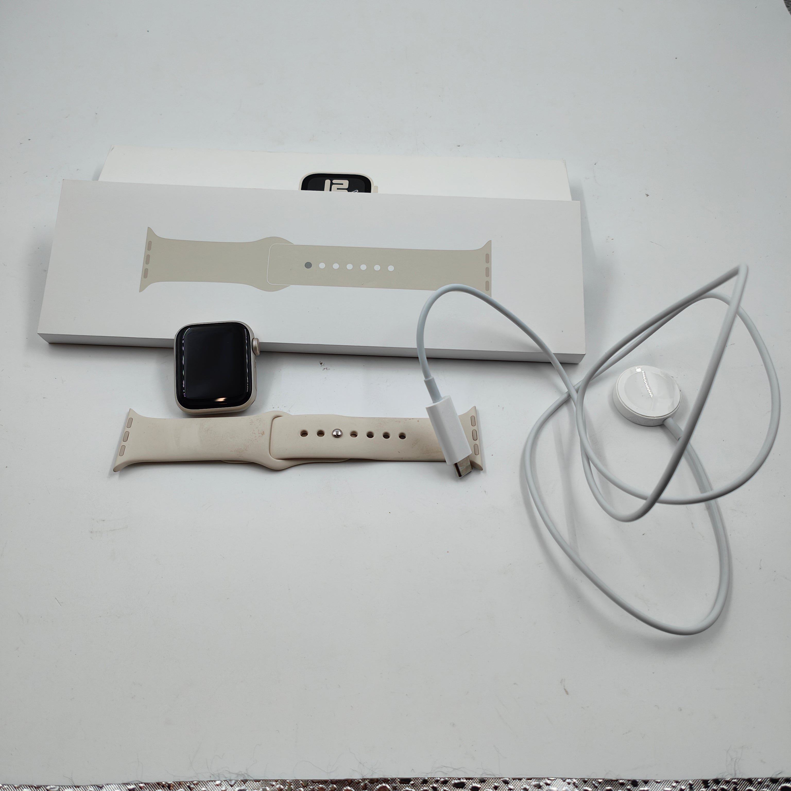 Apple Watch SE (2024) 40mm Starlight Sportband S/M