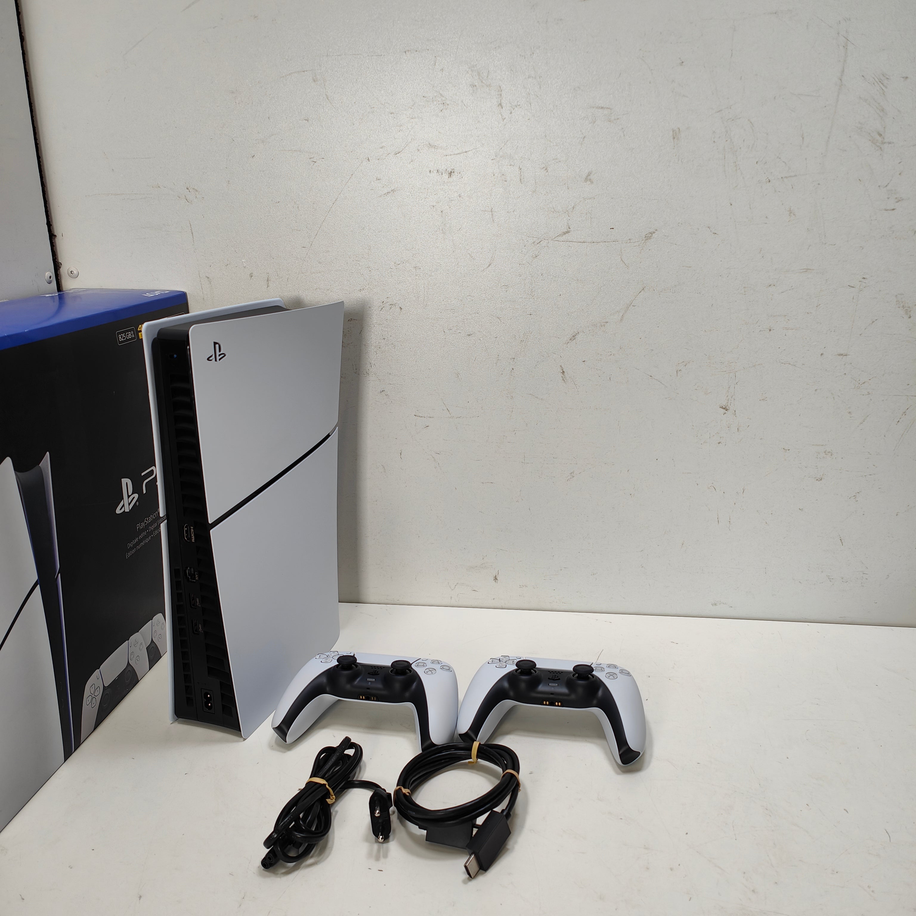 Sony PlayStation 5 Slim Digital Edition + zusätzlicher Controller, Weiß